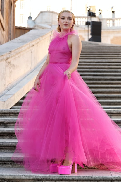 Florence Pugh wears a see-through pink dress to attend the Valentino Haute Couture Fall/Winter 22/23...