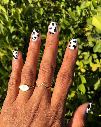 Cow print nails.