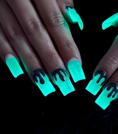 Green glowy goo nails.