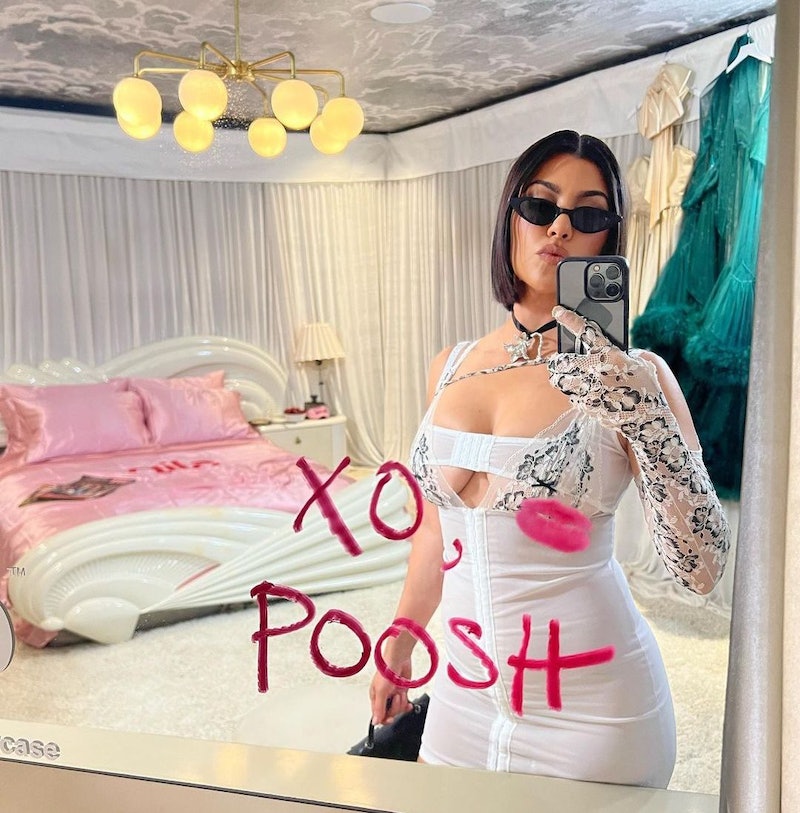 Poosh founder Kourtney Kardashian Barker wore cherry nails, a short white manicure with simple nail ...