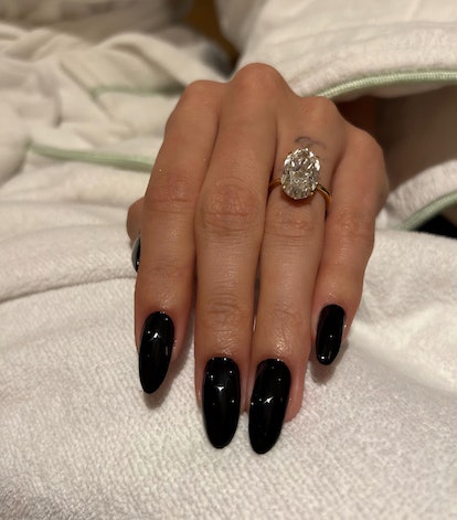 Manicurist Zola Ganzorigt painted Hailey Bieber's nails with the OPI GelColour in Black Onyx for the...